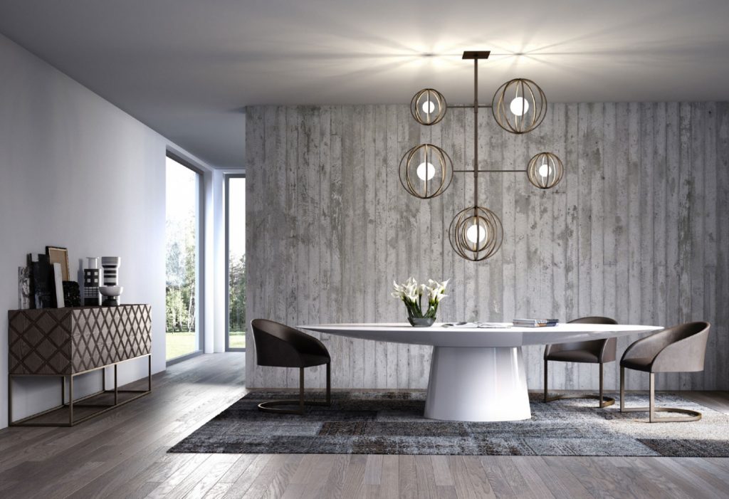 oval table made on a wooden base and lightly covered with leather and veneer in a white colour tone in a dining room