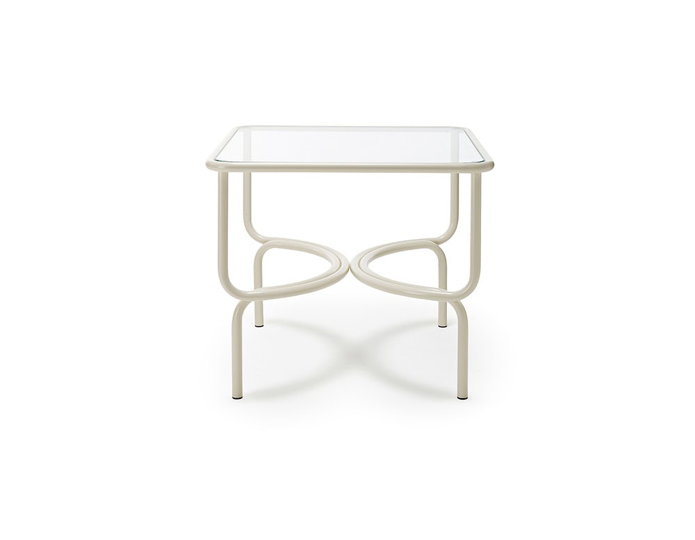 Square Locus Solus Dining Table. Crystal top and white metal structure on a white background.