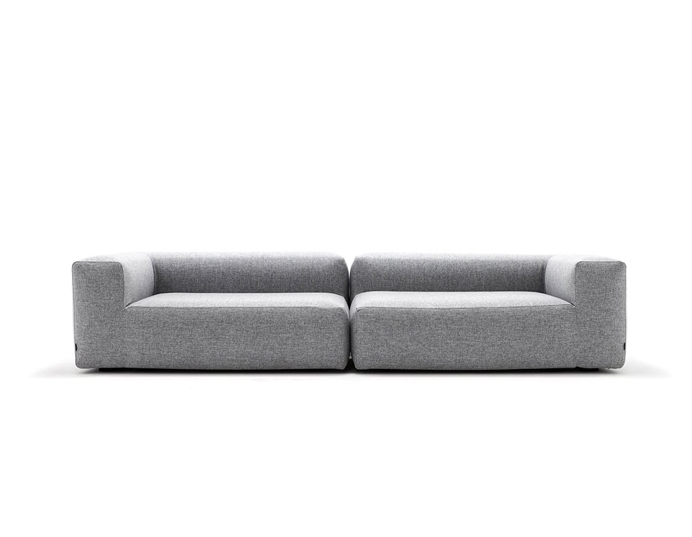 Two Montecarlo Lounge sofas with backrest and armrest in gray fabric on a white background.