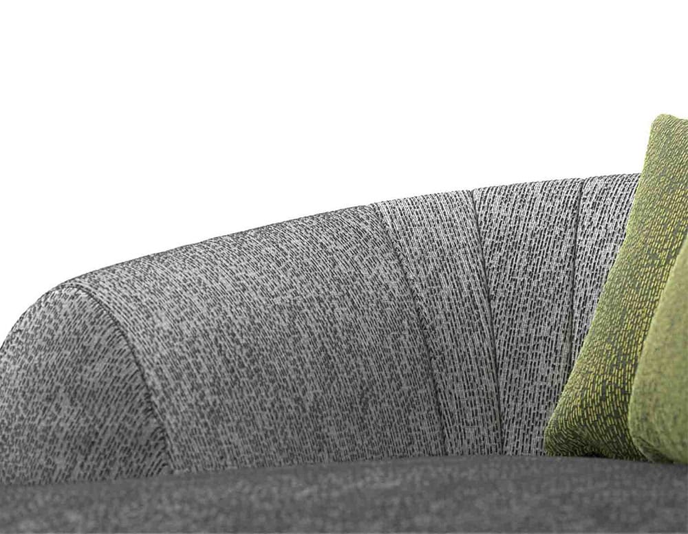 Closeup of Palau Daybed with armrest and backrest in gray on a white background.