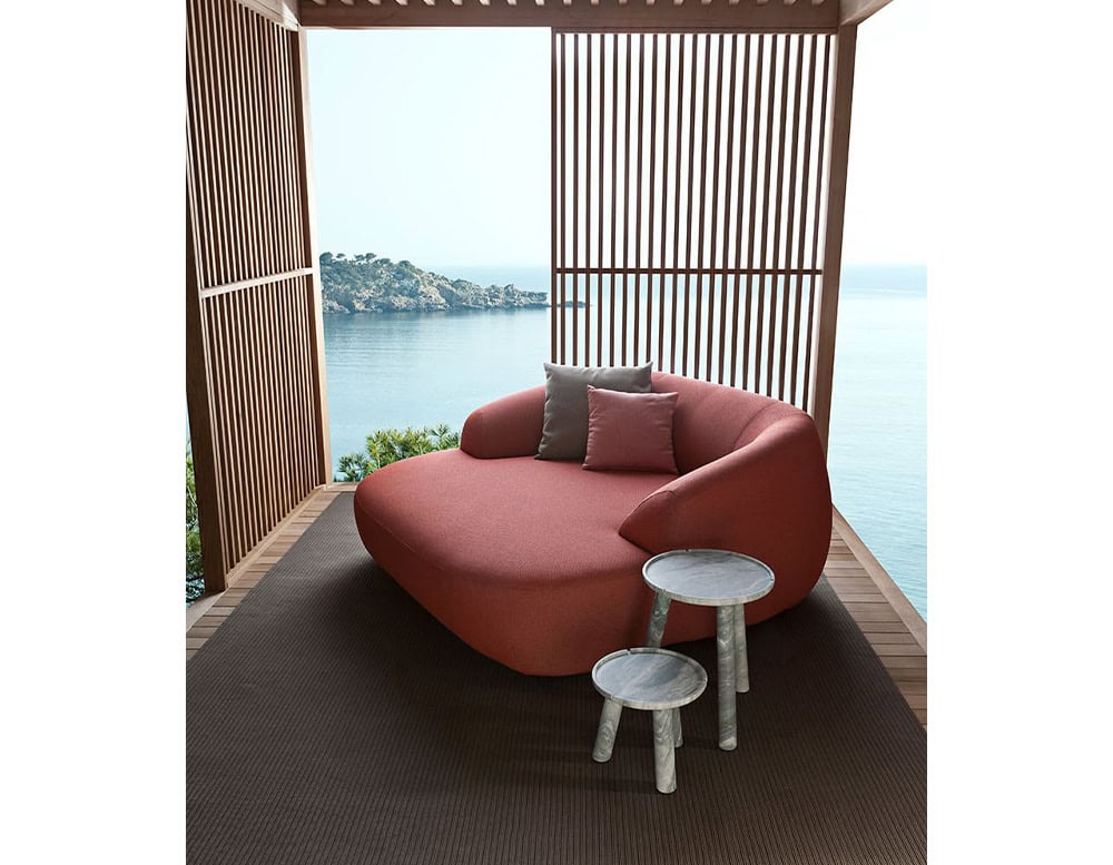 Palau Daybed with armrest and backrest in red in a living room