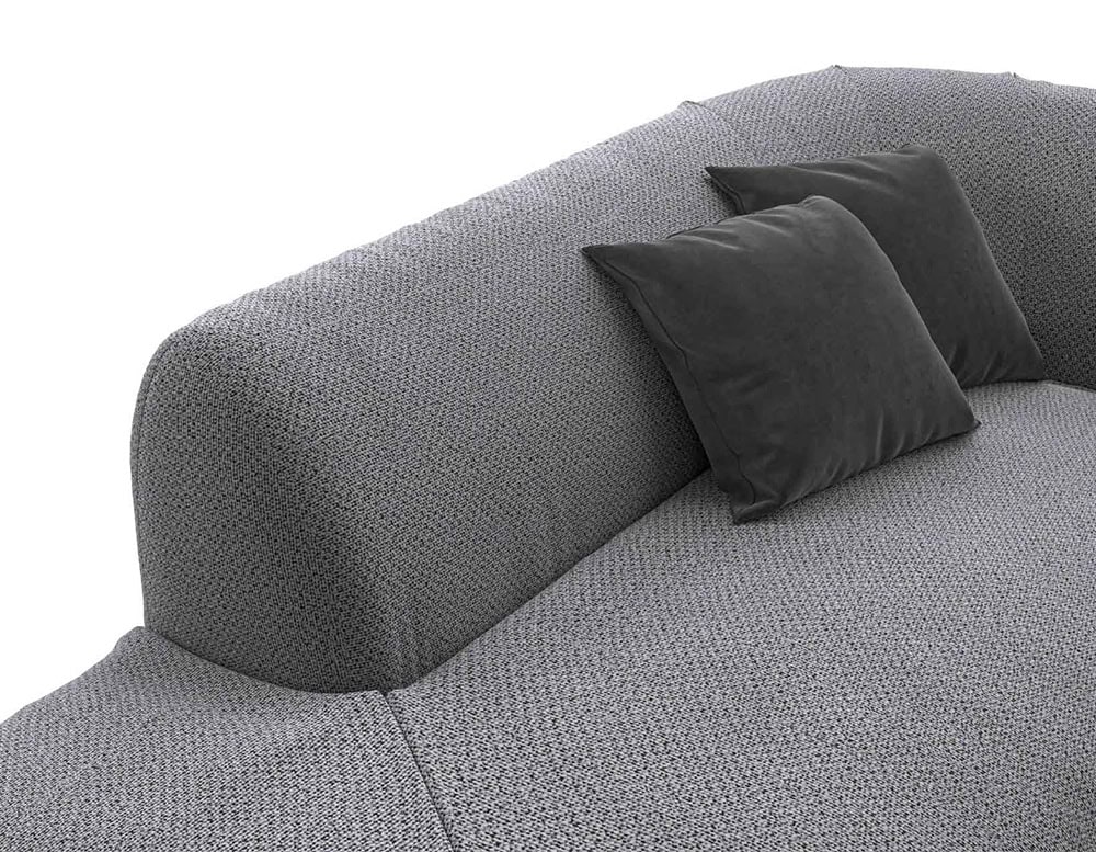 Closeup of Palau Dormeuse with armrest and backrest in gray on a white background.