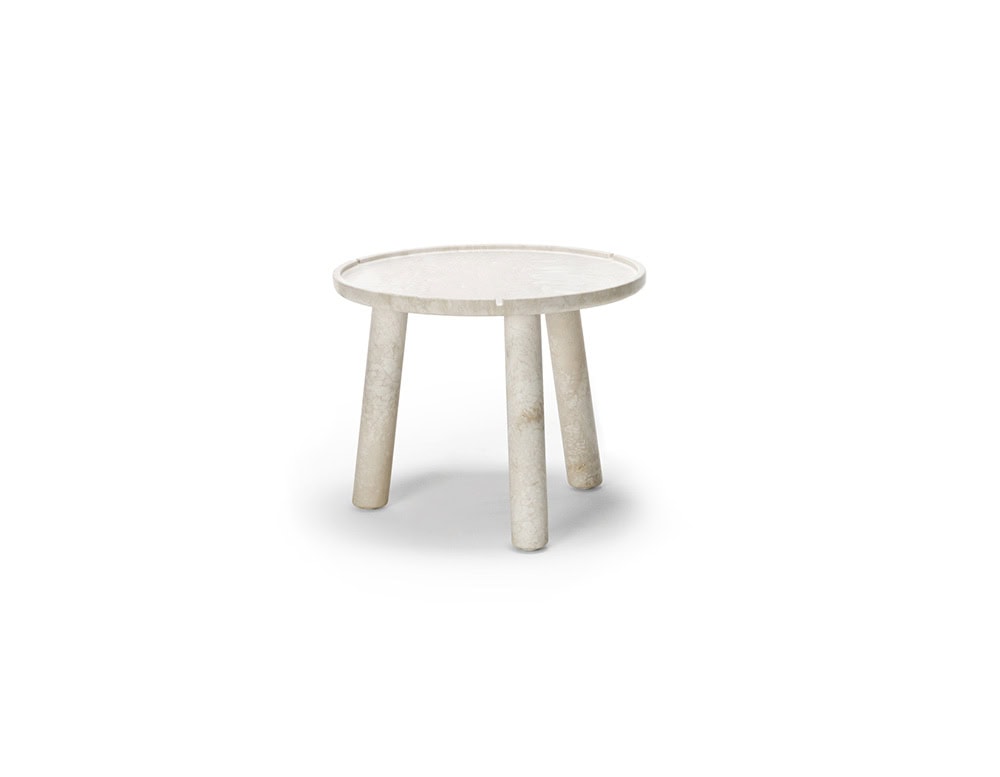 Stone Round Coffee table in white with three legs on a white background.