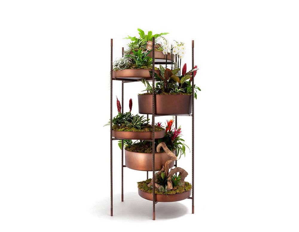 Brown Vertical Garden made of five round modules on a white background.