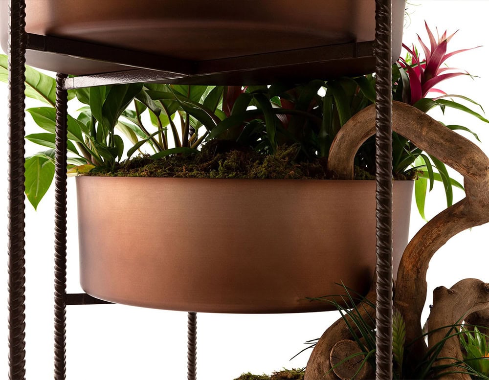 Brown Vertical Garden made of three round modules on a white background.