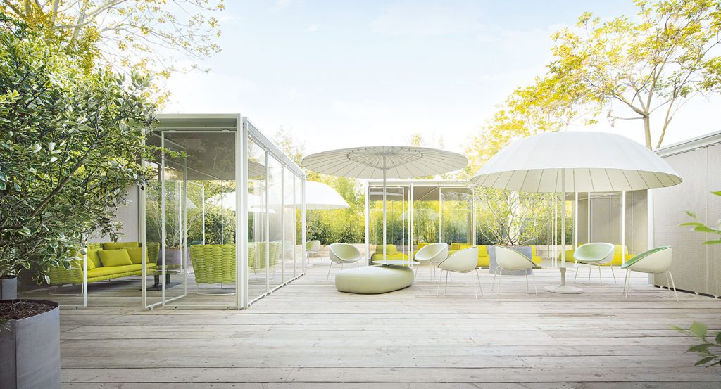 Six Amable Outdoor Chairs, four legs of white steel, white shell and rope cord cover, three in green and three in yellow in a terrace.