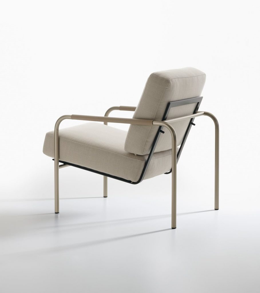 Susanna lounge chair with a sleek metal frame and light gray cushioned seat and backrest on a white background.