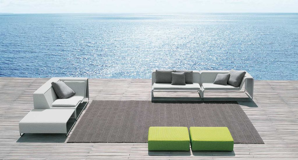 Three white Island Sectionals, structure in steel, upholstery in white rope fabric in a terrace.