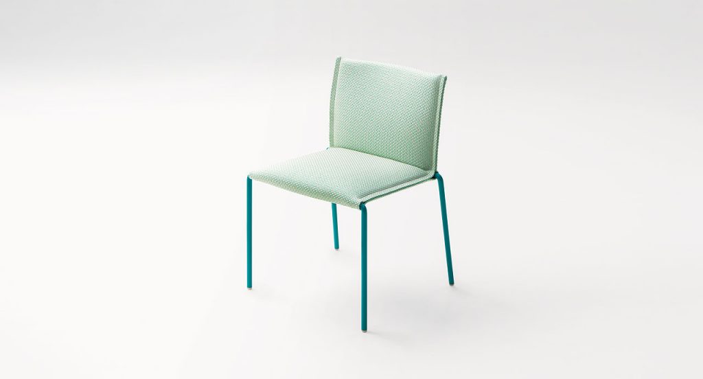 Green Mae chair, structure and legs of steel, upholstery in fabric on a white background.