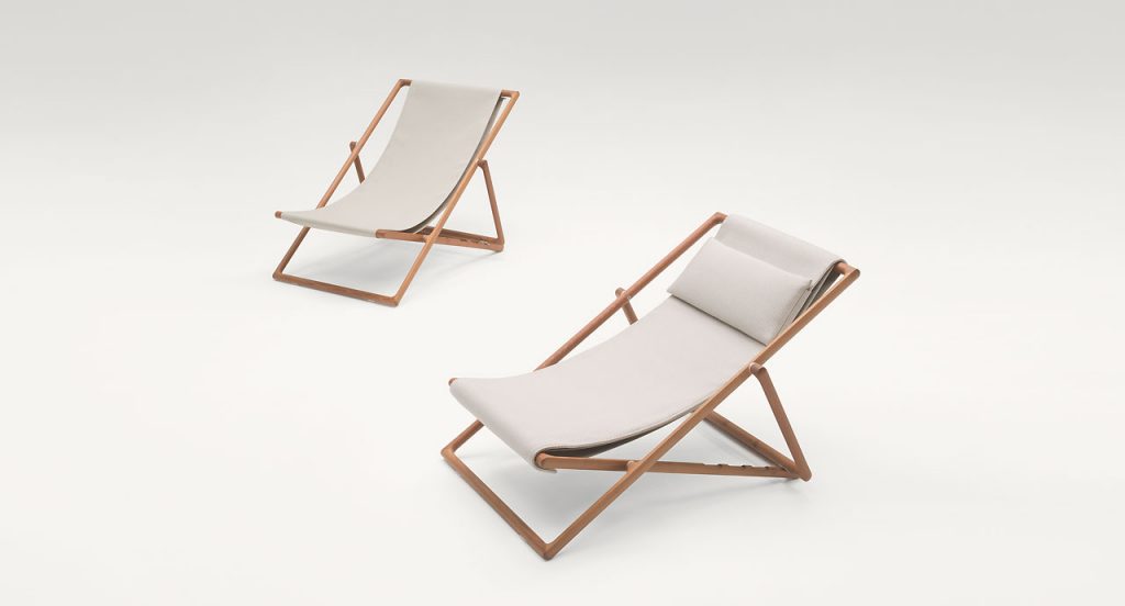 Two Portofino Outdoor Deck Chairs, structure in natural heartwood, upholstery in white fabrics on a white background.