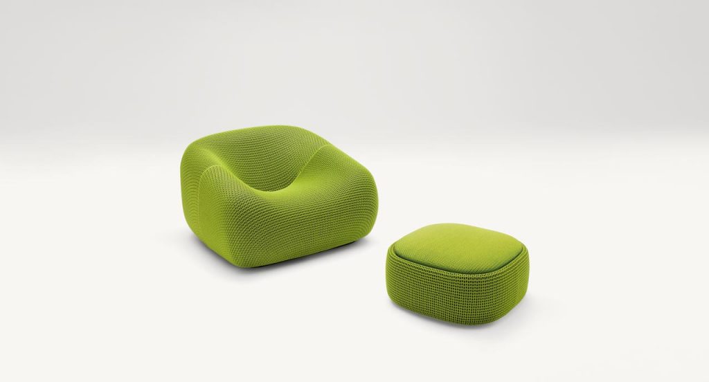 Square Smile Outdoor Pouf, upholstey in green aero fabric on a white background.