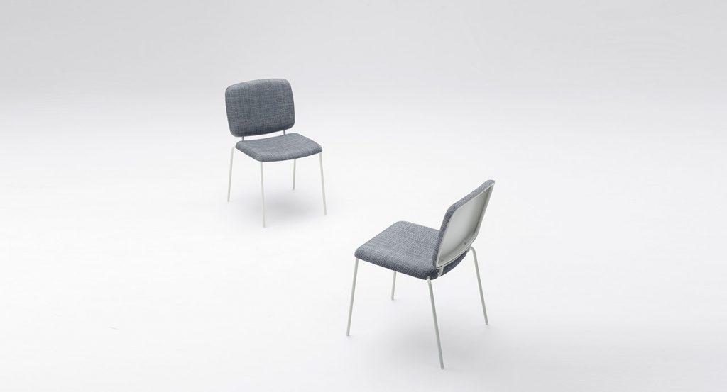 two chair made of stainless steel base covered in fabric in a blue tone on a white background