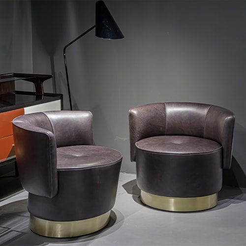 two armchair made of swivel satin metal base upholstered in dark brown leather