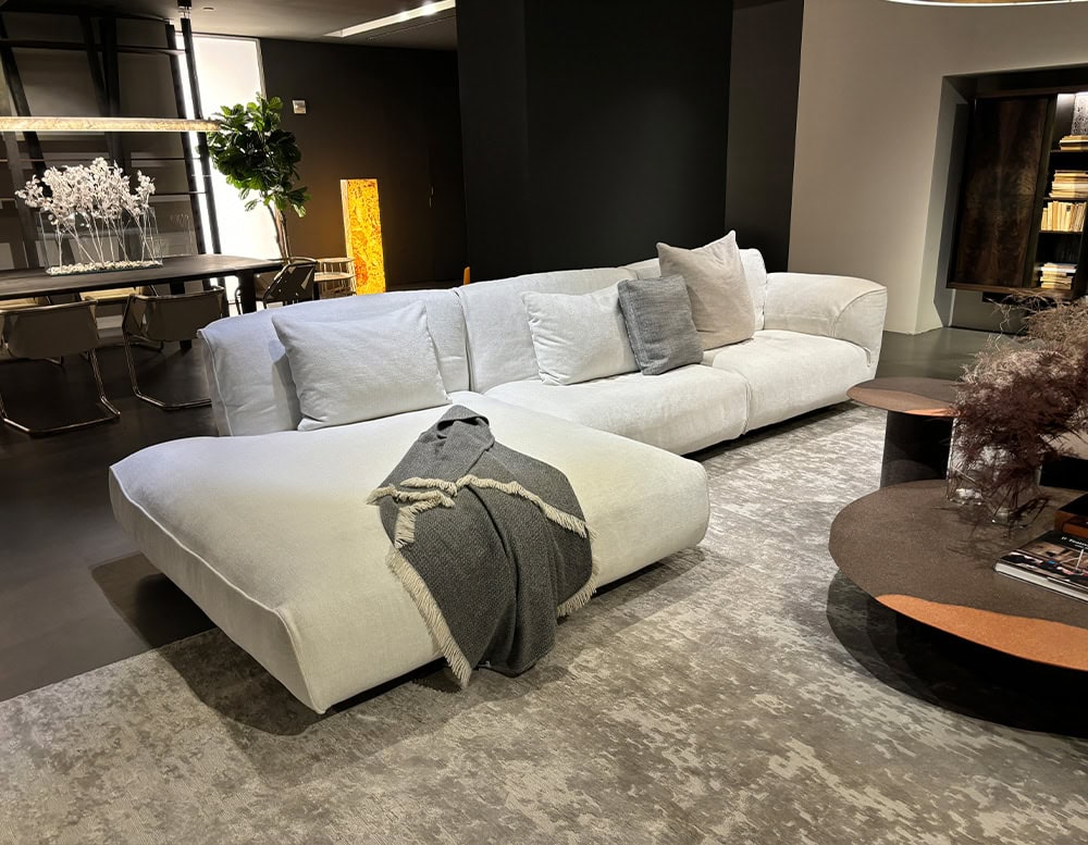 L shaped white Grande Soffice Sofa in a living room