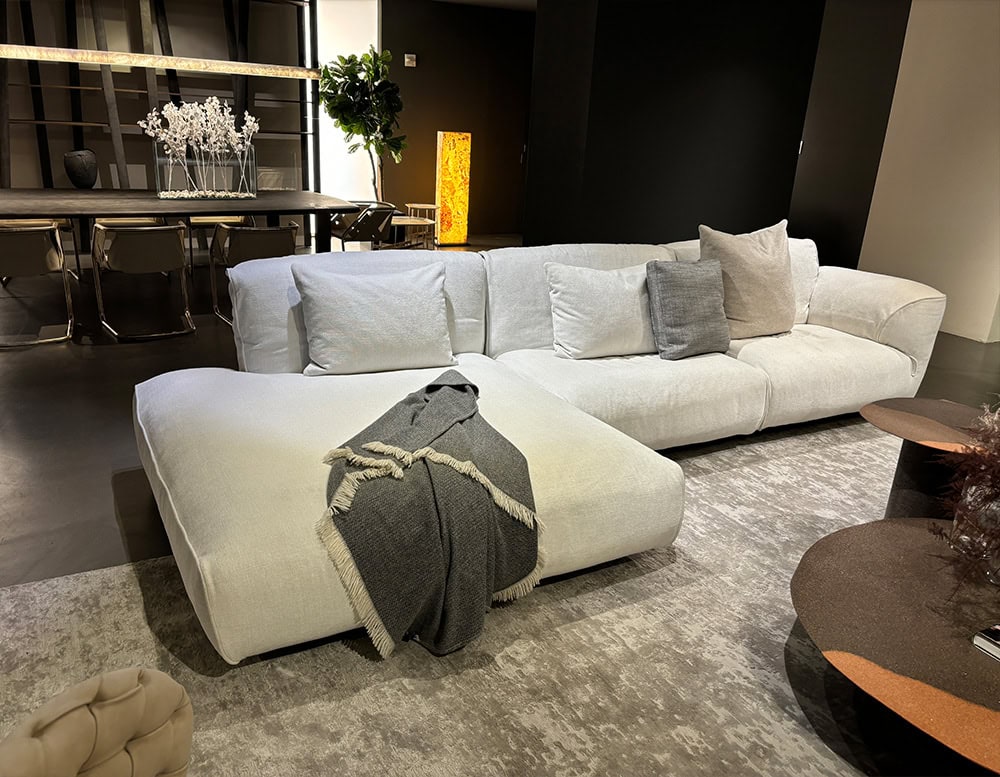 L shaped white Grande Soffice Sofa in a living room