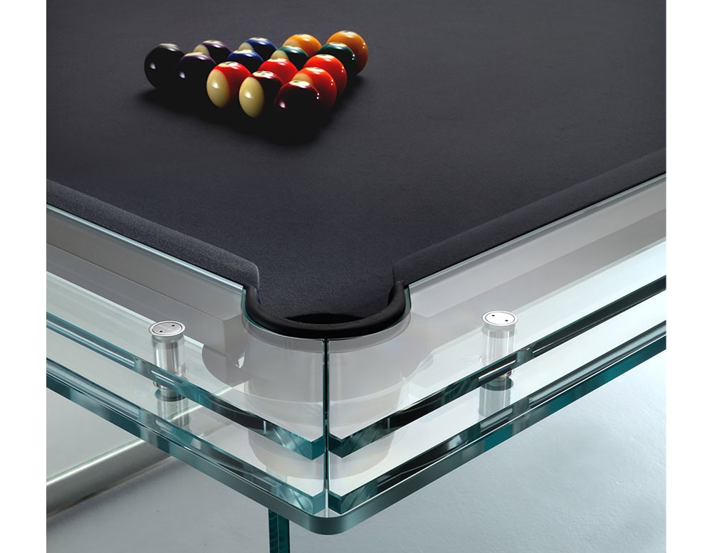 glass table made of transparent glass base and table made of black fabric