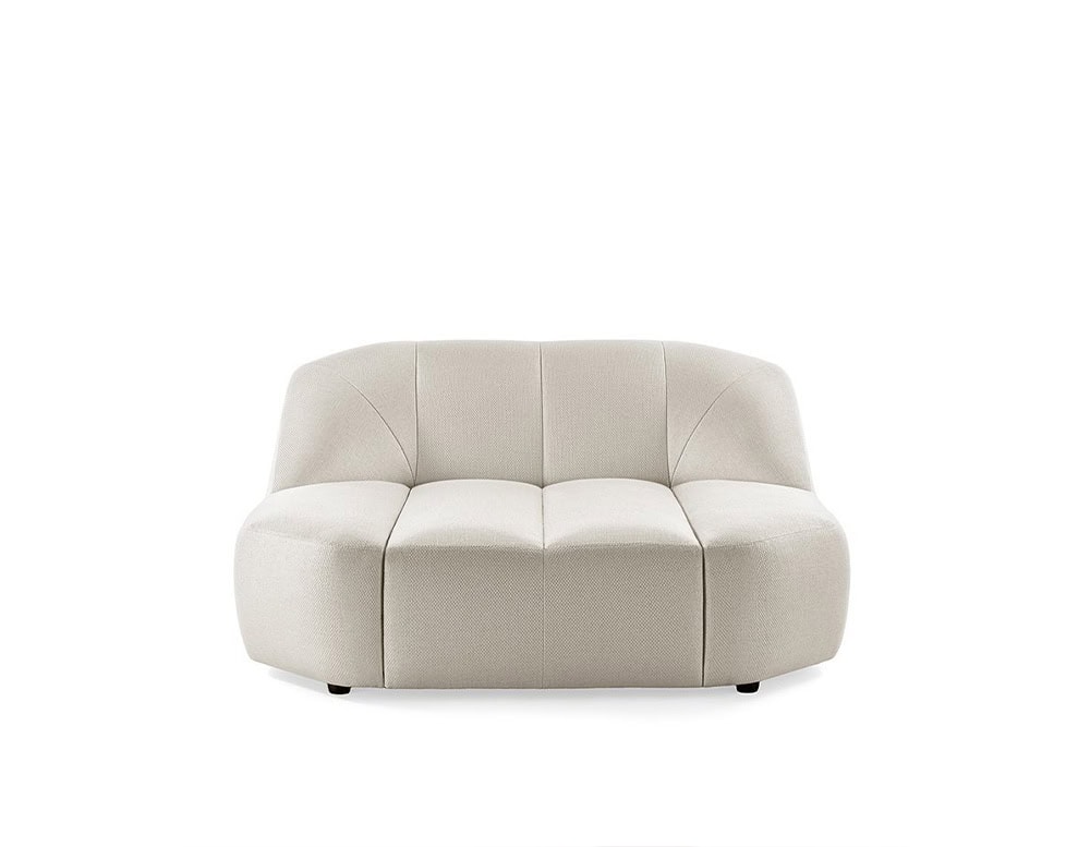 Armchair made of polyurethane foam, wooden base and upholstered in white leather.