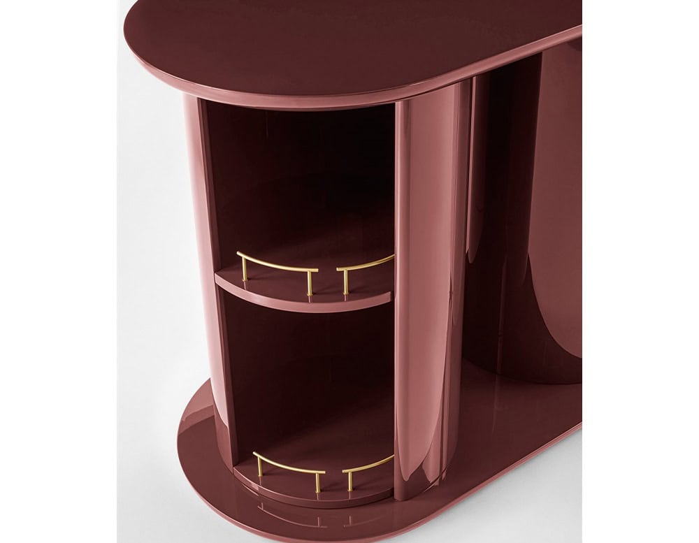 sideboard made of a wooden base with heavy-duty and circular drawers in a bright red wine color tone on a white background