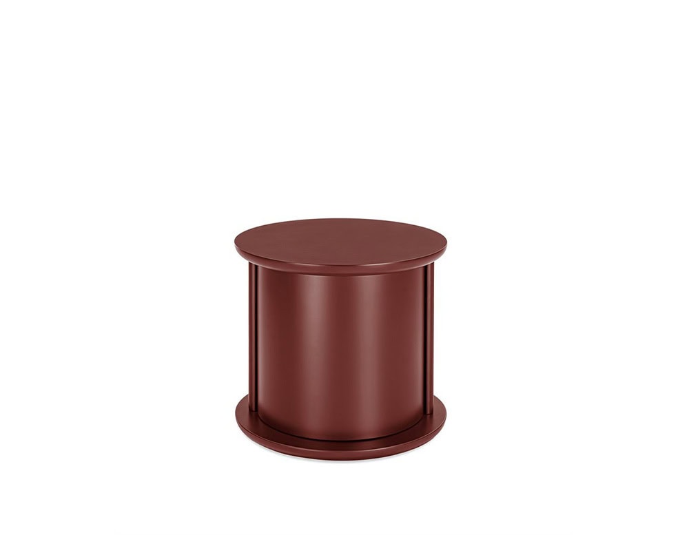 rotating coffee table made in the shape of a cylinder and made of wood in a bright red wine color tone on a white background