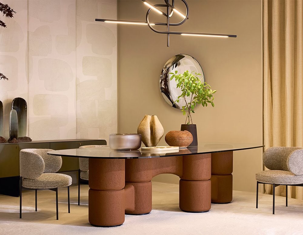 dining table made of thick transparent glass and hand-brushed wooden base in a brick color tone