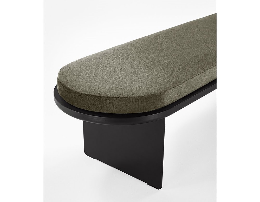 wooden bench made of black lacquer metal base and long cushion made of espima in a brown tone