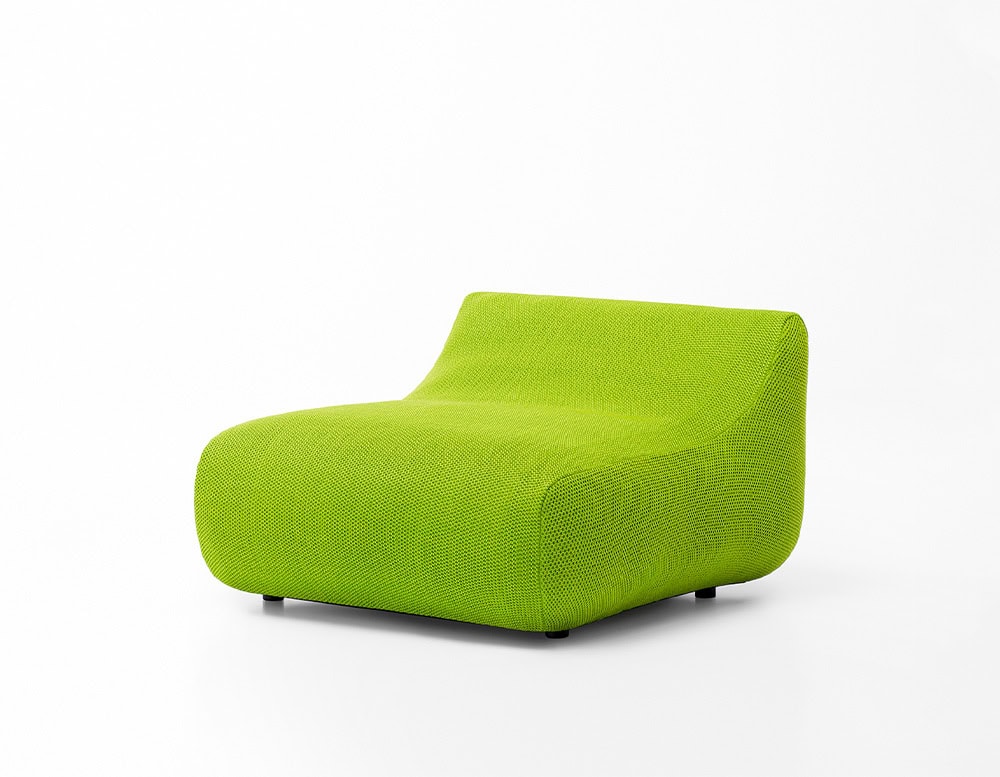 Armchair made of stainless steel base and upholstered in removable fabric in a light green tone