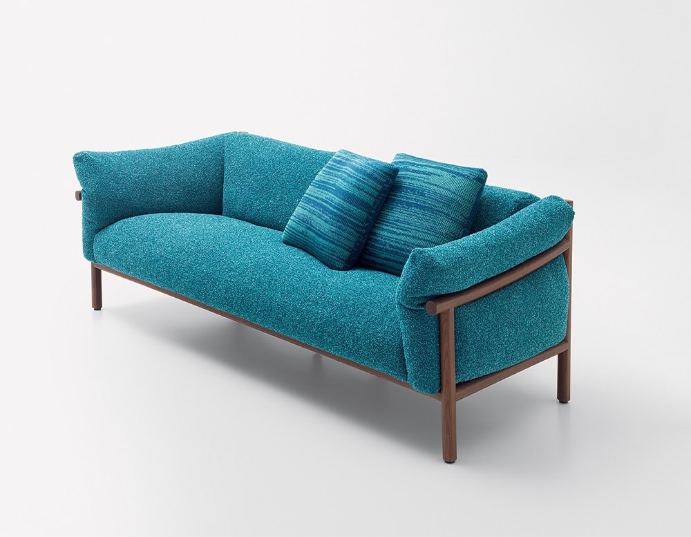 sofa made of brown wood base and foam filling upholstered in aquamarine blue fabric