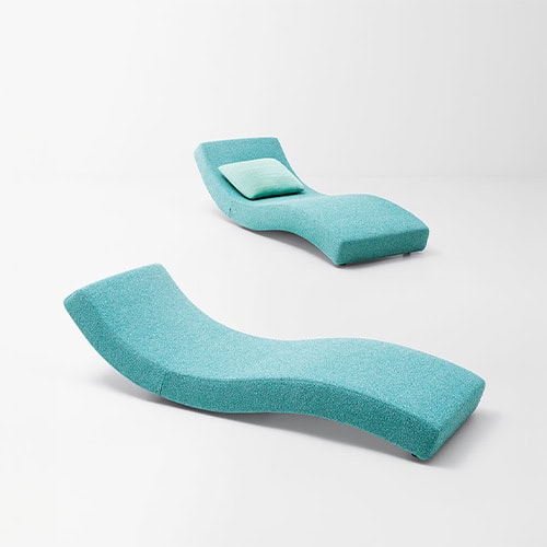 two pool chairs with adjustable backrest in two different positions made of steel and foam padding upholstered in blue tone fabric