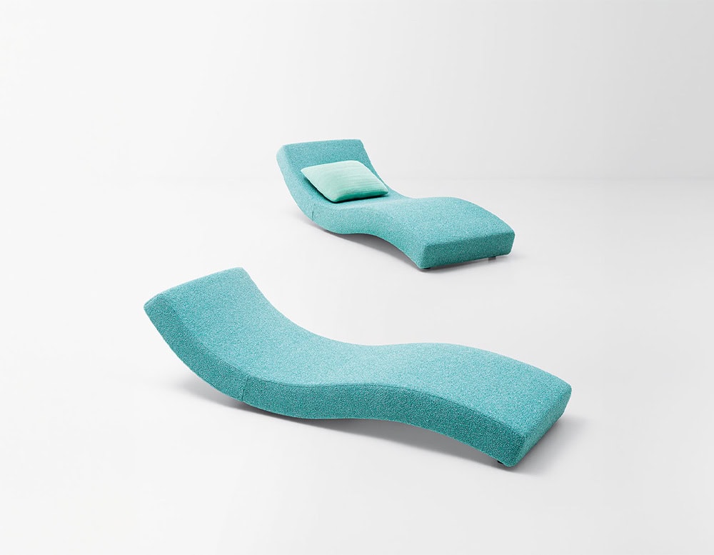 two pool chairs with adjustable backrest in two different positions made of steel and foam padding upholstered in blue tone fabric