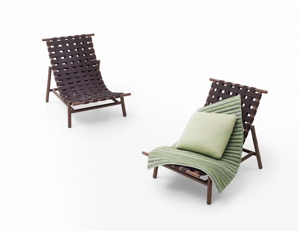 two wooden armchairs with a green cushion, a dark brown tone on a white background