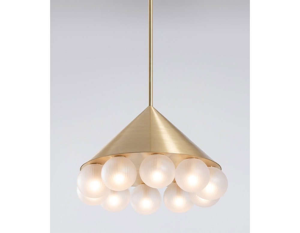 ring lamp with spheres made of glass in a white and gold tone