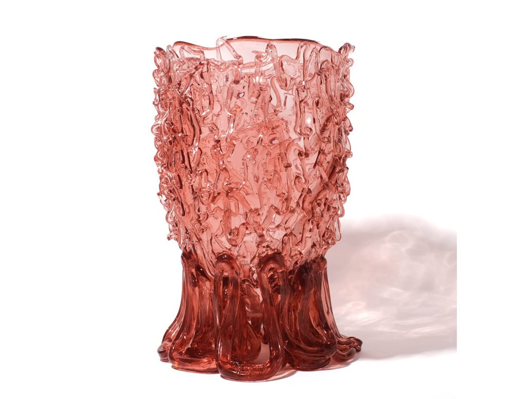 Medusa Vase Pink in translucent with irregular pattern on a white background.