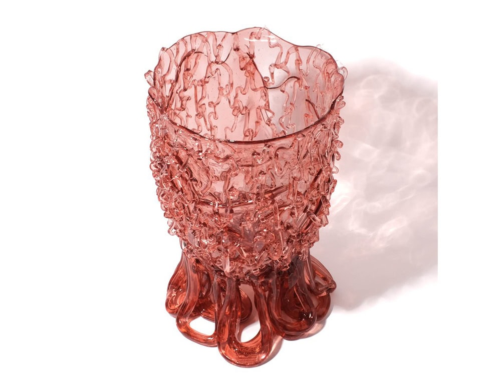 Medusa Vase Pink in translucent with irregular pattern on a white background.