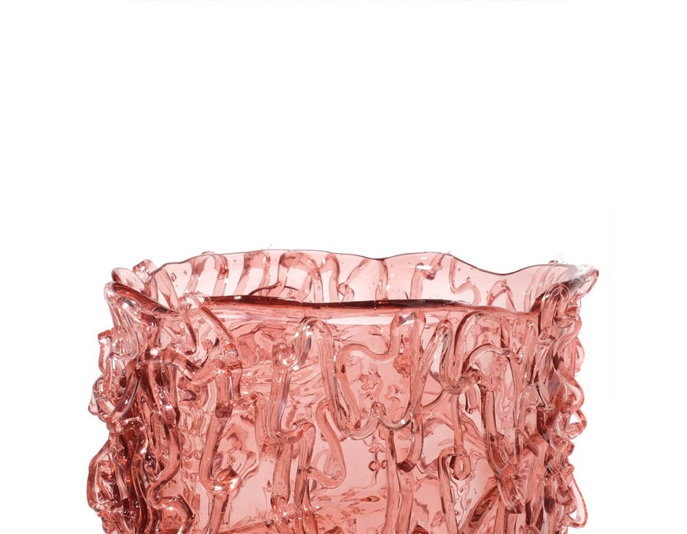 Top part of Medusa Vase Pink in translucent with irregular pattern on a white background.