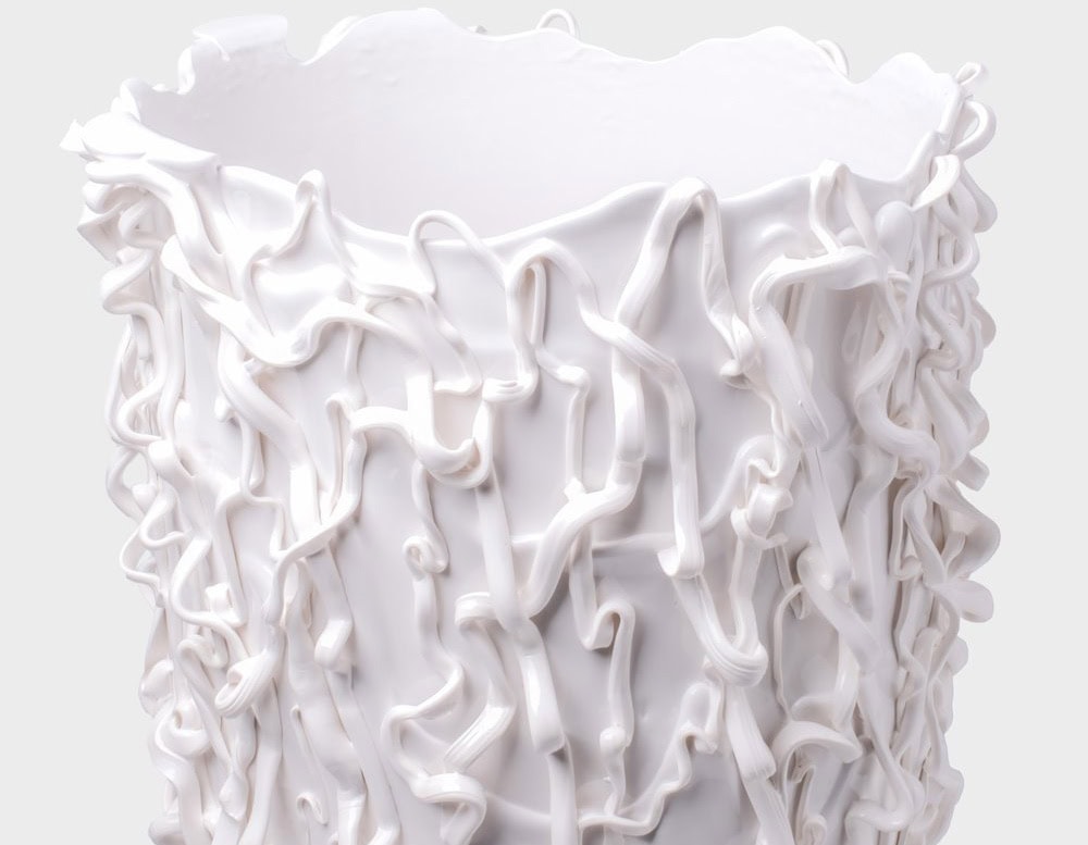 Top part of Medusa Vase White with irregular pattern on a white background.