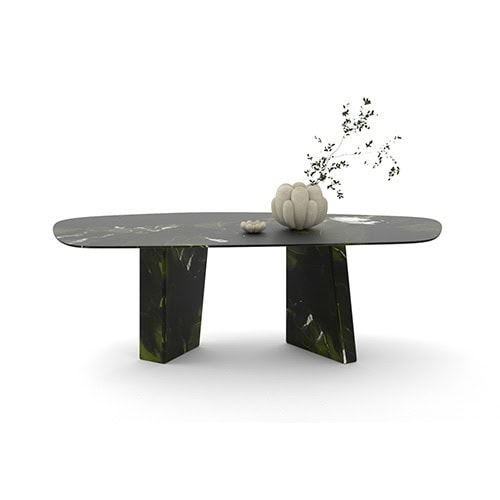 Oval Paramount dining table in black marble with white lines, set against a white background.