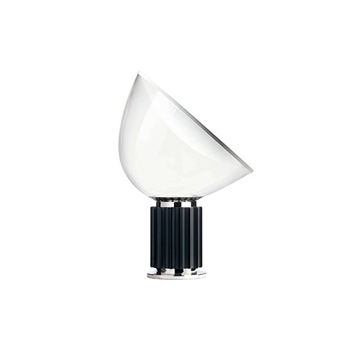 Flos Taccia table lamp with a transparent half circle top and a black oval base on a white background.